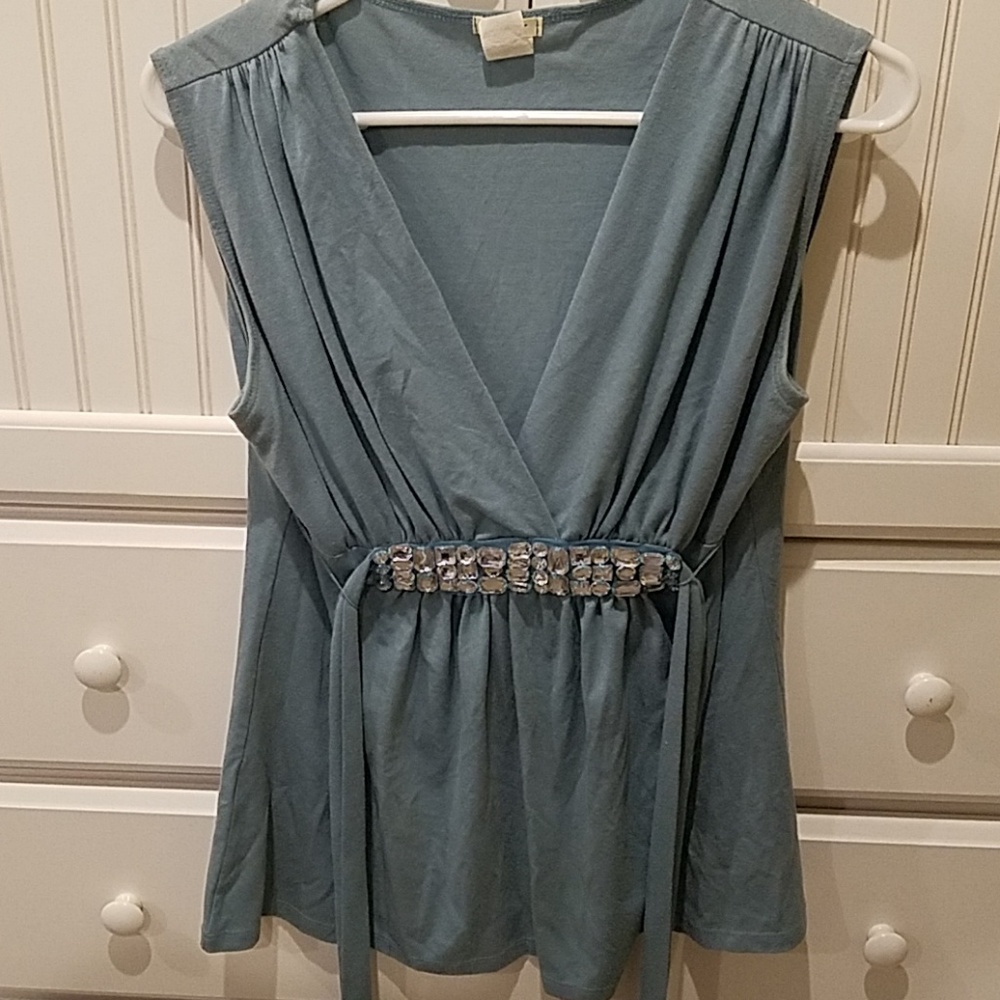 Blue tank top with embellishments on front